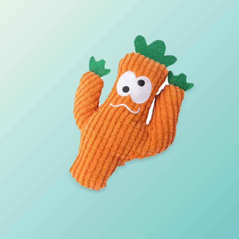 Orange plush carrot catnip toy with green leaf arms and googly eyes